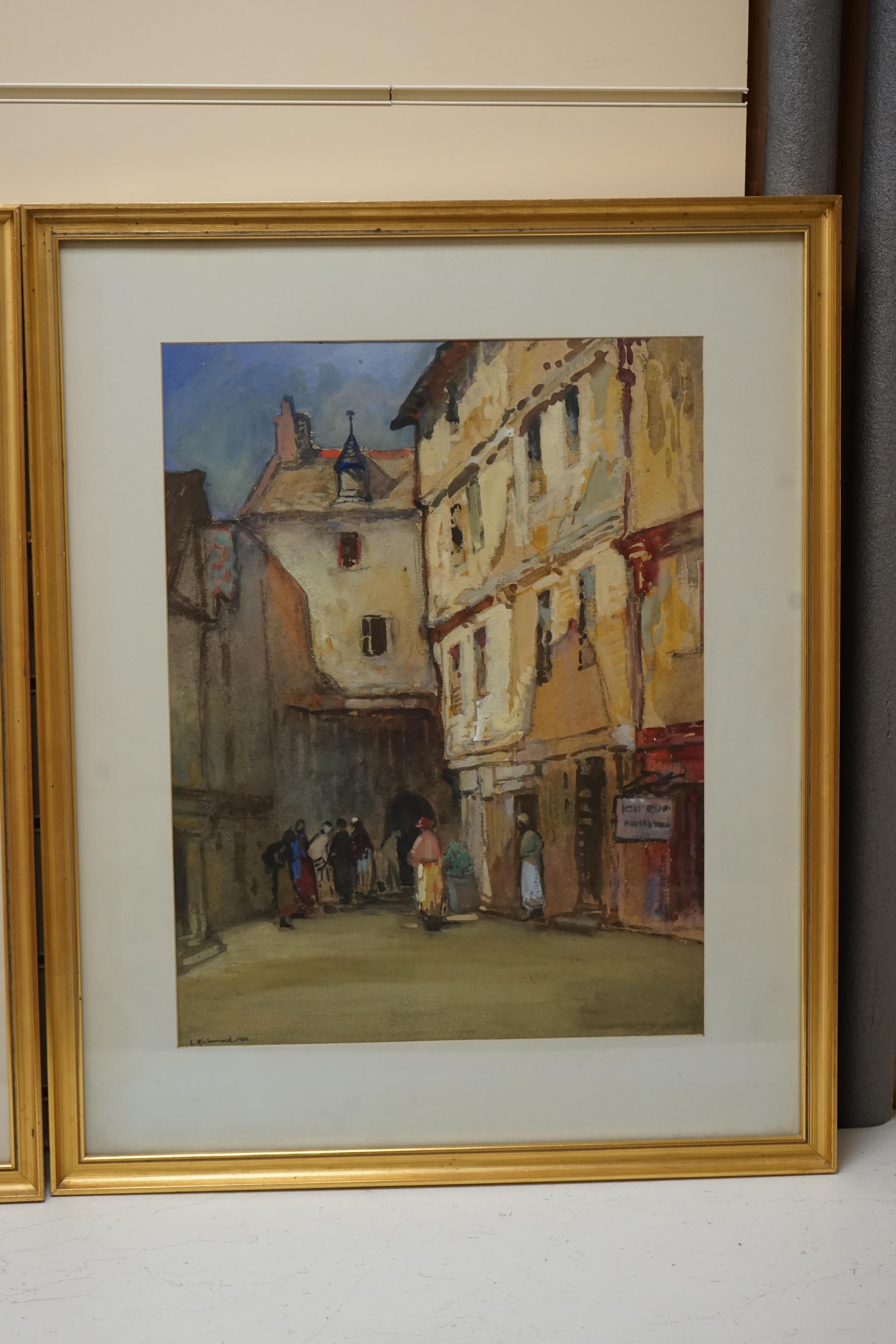 Leonard Richmond (1889-1965), pair of gouaches and pastels, Street scenes with figures, each signed and dated 1922, 48 x 37cm. Condition - good